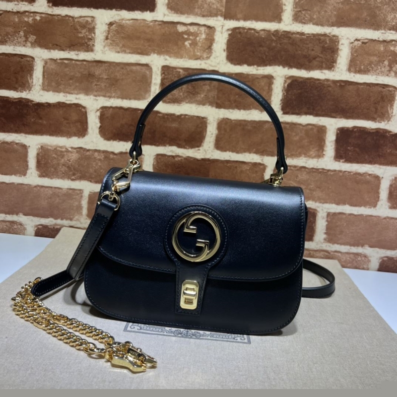G*u*i top handle bags